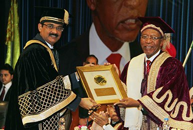 Dr. Mittal confers degree on PM Mosisili
